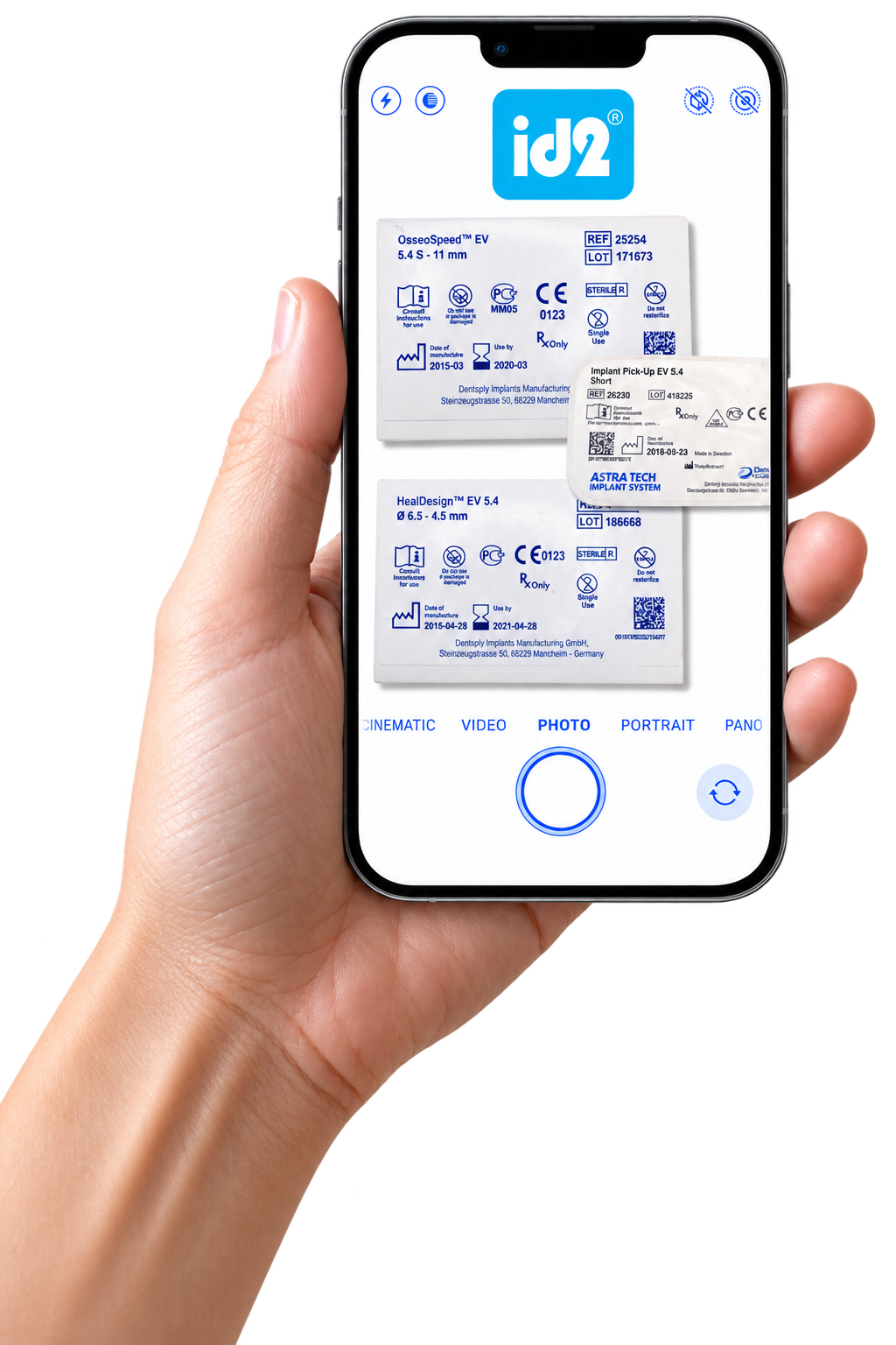 Hand holding phone capturing dental implant labels